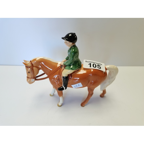 105 - Beswick Boy on Palomino pony with dark green jacket (minute repair on left ear)