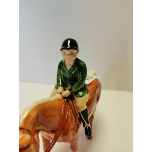 105 - Beswick Boy on Palomino pony with dark green jacket (minute repair on left ear)