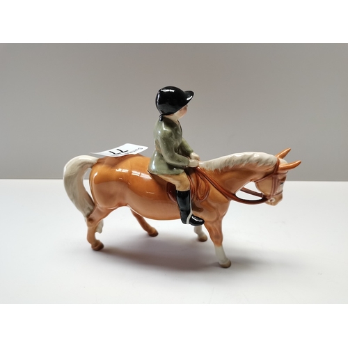 77 - Beswick boy on Palomino pony