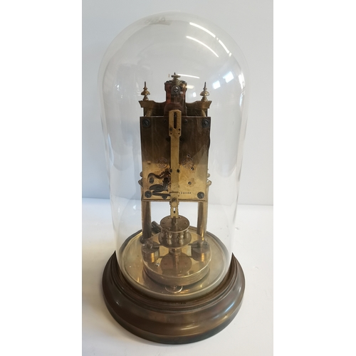 466 - Brass clock in glass dome