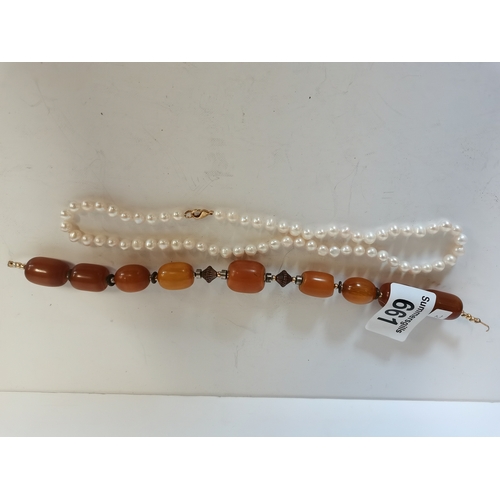 661 - Amber style necklace and pearls