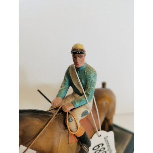 688 - Ronson lighter and jockey figure