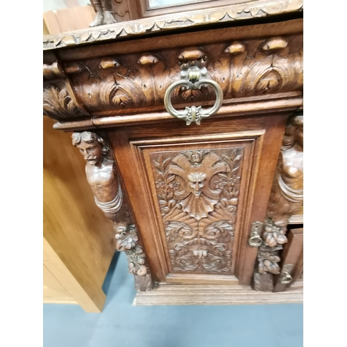 1147 - An Antique Large Heavily Carved Dutch Style sideboard with mirror back. Fabulous carved figurines.... 