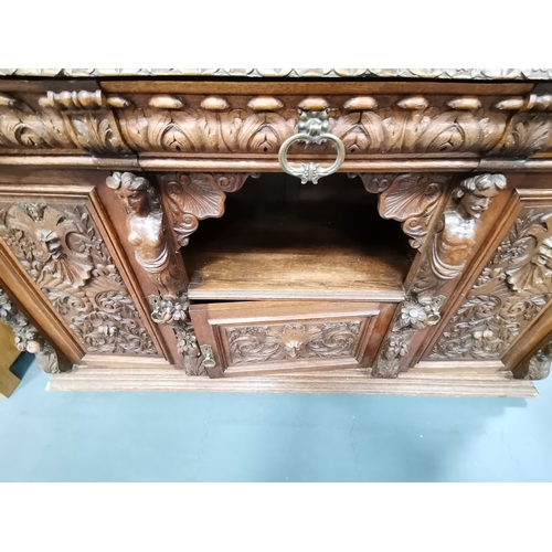 1147 - An Antique Large Heavily Carved Dutch Style sideboard with mirror back. Fabulous carved figurines.... 