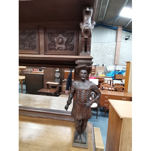 1147 - An Antique Large Heavily Carved Dutch Style sideboard with mirror back. Fabulous carved figurines.... 