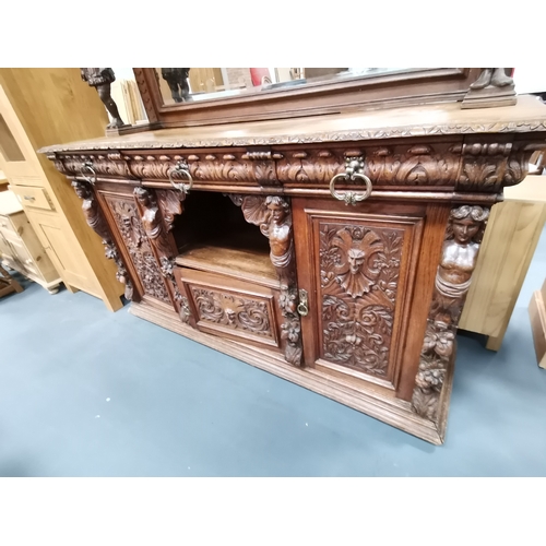 1147 - An Antique Large Heavily Carved Dutch Style sideboard with mirror back. Fabulous carved figurines.... 