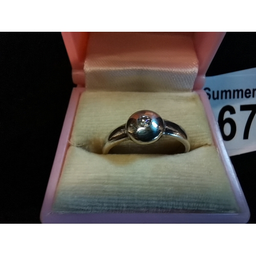 677 - Platinum ring with diamond centre stone as new hallmarked size O