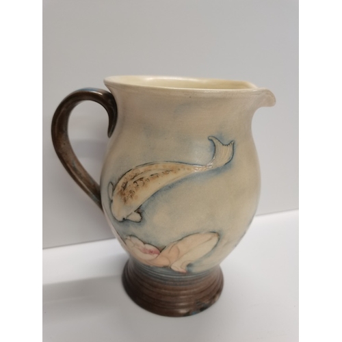 174 - A rare Moorcroft matt glazed fish jug 1930s painted in pastel tones and well signed on base18cm in e... 