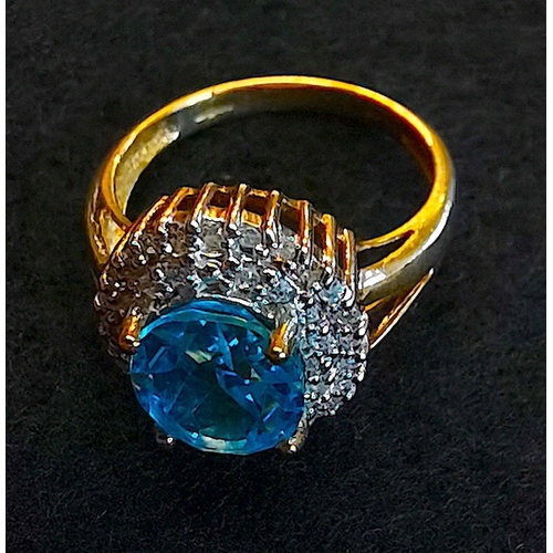 361 - 9ct Gold Dress Ring blue stone diamonds