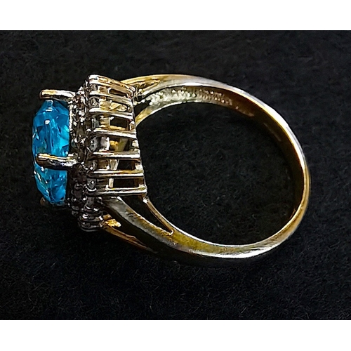 361 - 9ct Gold Dress Ring blue stone diamonds