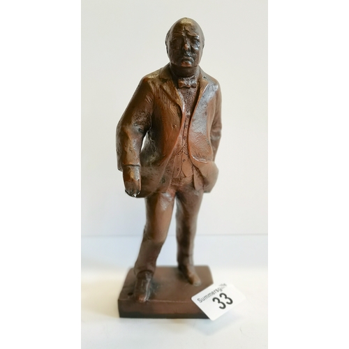 33 - A bronze figure 22cm of Winston Churchill figure signed