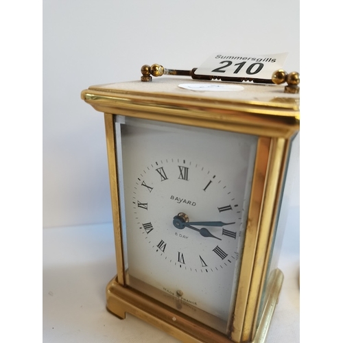 210 - Carriage Clock plus Oval Wind up Clock