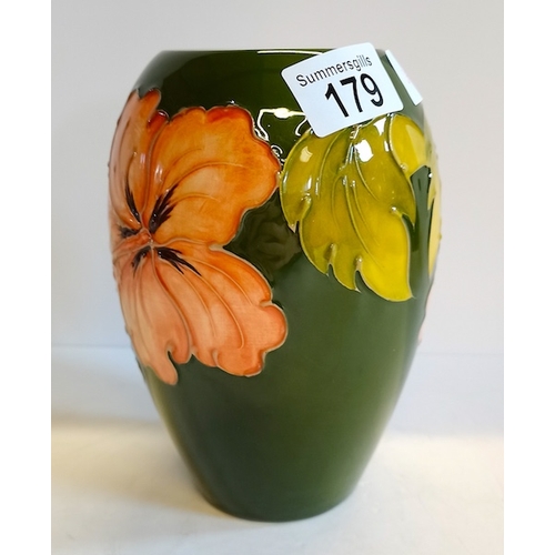 179 - Moorcroft Green Hibiscus vase 18cm height