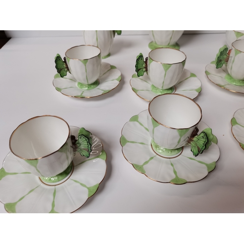 513 - Aynsley butterfly handled coffee set  (  2 hairline cracks to 2 cups and spout repaired on the tea p... 