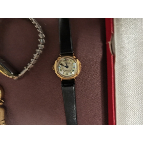 446l - 4 gold watches and 1 plated