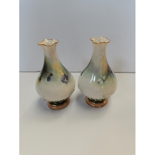 110b - A pair of Royal Worcester vases, painted with violets No 285, green mark 11cm tall. (chip on undersi... 