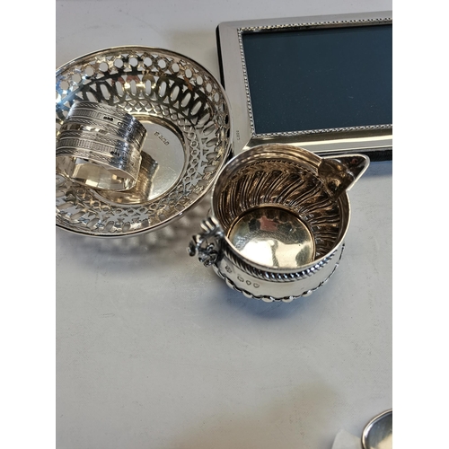 325 - Silver items incl. napkin rings, jug, bowls picture frame