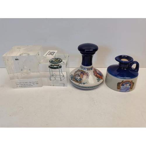 259 - x2 British Navy Rum miniatures and x2 rum measure and cork paperweights