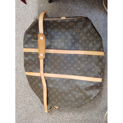 278 - Genuine Louis Vuitton suit carrier and Keepall Duffel brown bag and a Visconti leather documents fol... 