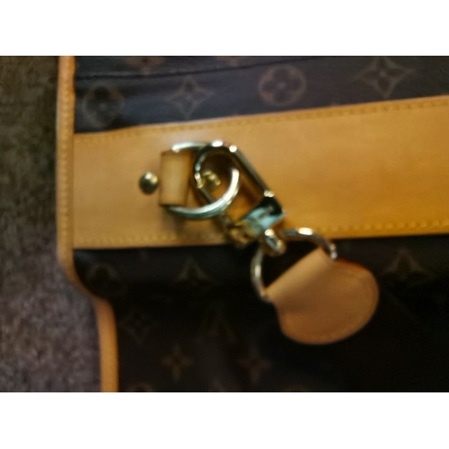 278 - Genuine Louis Vuitton suit carrier and Keepall Duffel brown bag and a Visconti leather documents fol... 