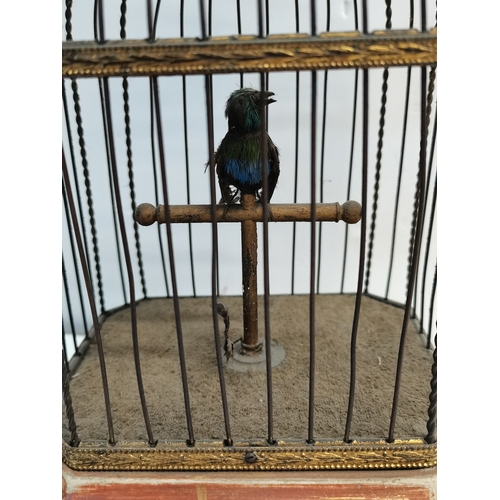 204 - Antique 27cm high cage Automaton with bird and working condition