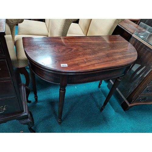 1015 - Crescent shaped Mahogany Fold over side table