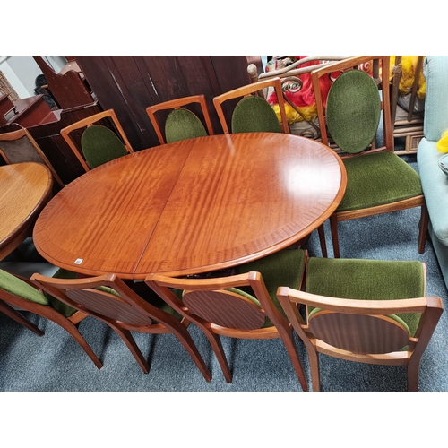 868 - Oval extendable dining table and 8 chairs with green velvet seats and back W100cm x L160cm not exten... 