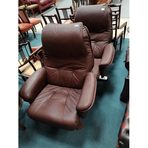 1035 - Pair of brown leather style swivel chairs