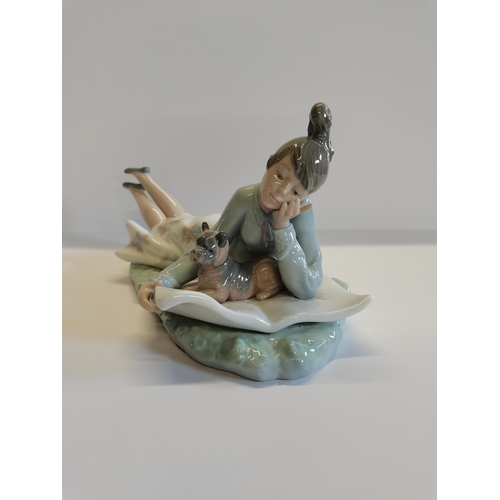 104 - Nao figure - 'Lying girl with dog' good condition