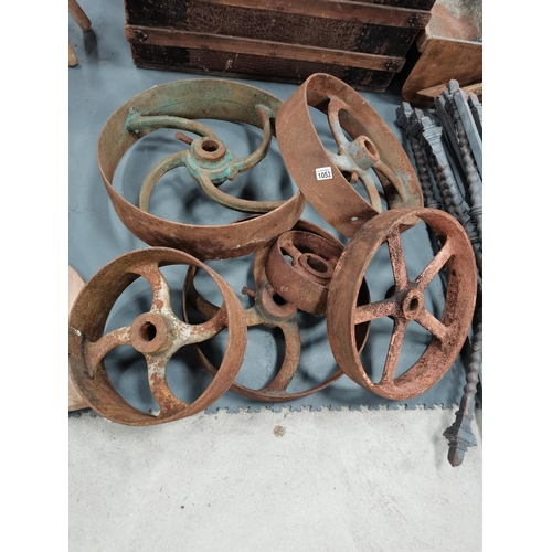 1053 - a collection of 6 iron wheels