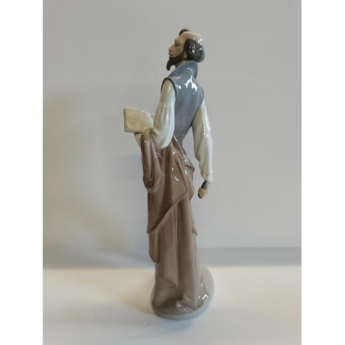 108 - Nao figure - 'Don Quixote reading a book' missing sword blade