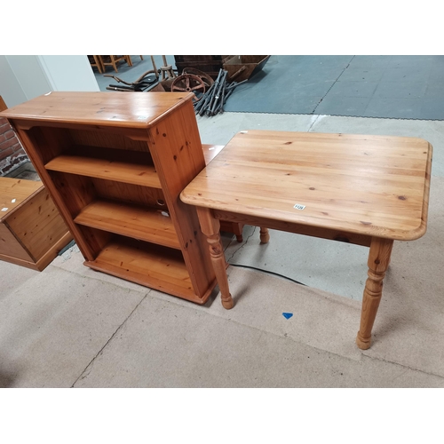 1128 - Pine table and bookcase