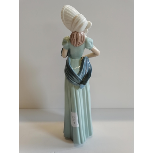 124 - Nao figure - 'lady in blue with white hat' good condition