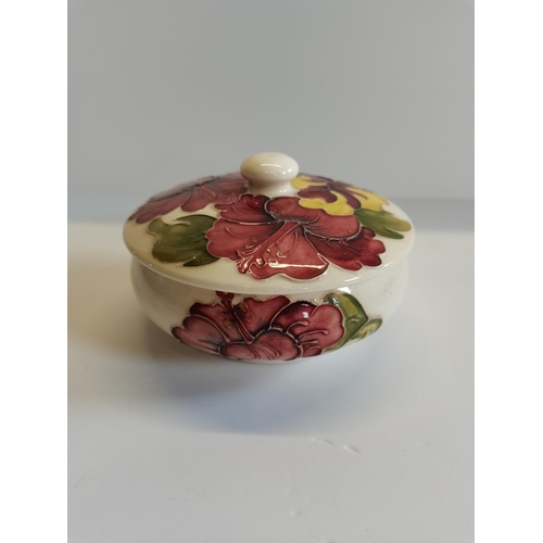 192 - Moorcroft Hibiscus circular trinket box with lid -some crazing in base and inner lid