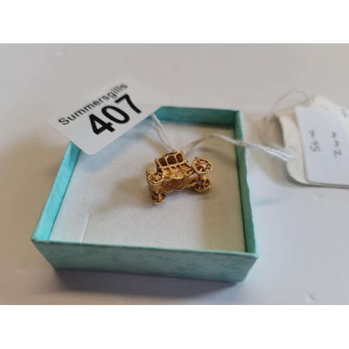 407 - 9ct Gold Carriage charm 3.4grams