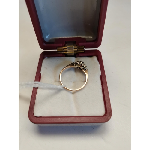 444 - 9ct Gold Ruby & Diamond ring. 5 diamonds either side (one missing each side) size K