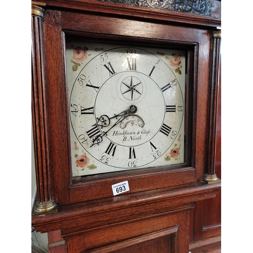 693 - 30 hour grandfather clock in oak case by Hinkfman and Glafe B. North