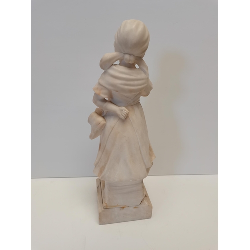 82 - Marble figure of girl holding shoes