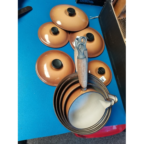 826 - Le Creuset 5 piece pan set in Brown 1 is  A/F others ok