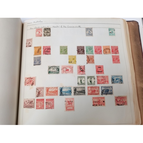 86 - Old leather bound stamp album full of stamps including Penny blacks, Penny reds etc etc