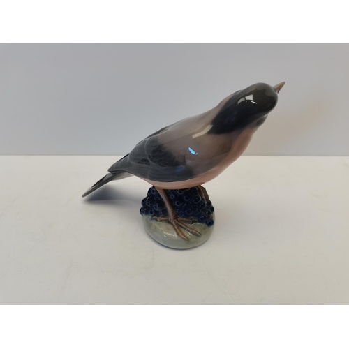 168 - Royal Copenhagen figurine. Redwing sitting on berries - No1235