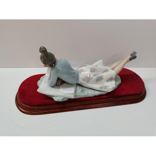 159 - Nao figure - 'Lying girl with dog' Condition Grade:  A Excellent: