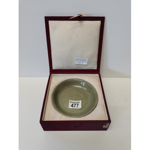 477 - A 14cm early olive coloured bowl in case excellent condition