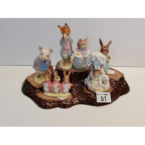 51 - X1 Base and x6 Beatrix potter figures (1 as found)