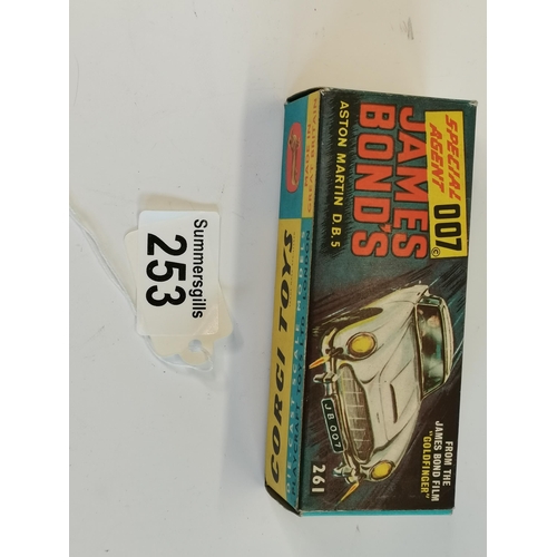 253 - Corgi James Bond Aston Martin db5 model number 261in gold with original packaging. box ex condition ... 