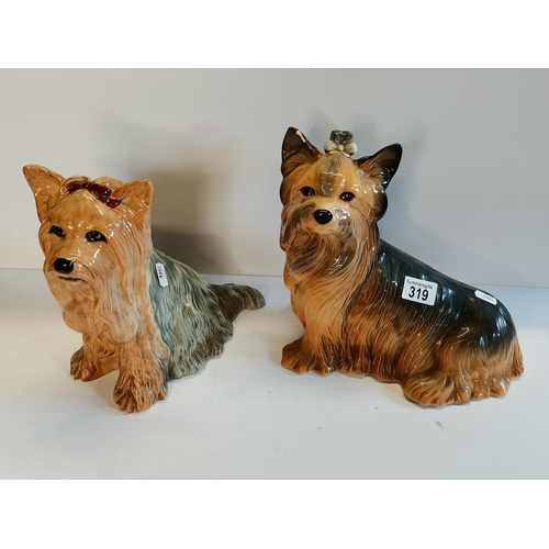 319 - x1 Royal Doulton Yorkshire Terrier figure excellent condition plus one other damage to ear