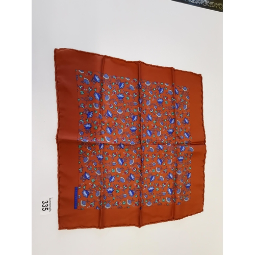 335 - Genuine Hermes 100% silk pocket square. Decorative floral pattern with blue flower heads on bronzed ... 