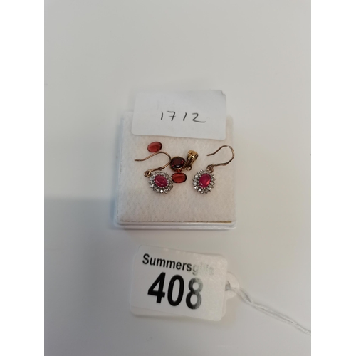 408 - A pair of gold ruby and diamond earrings plus ruby pendant and x2 stones