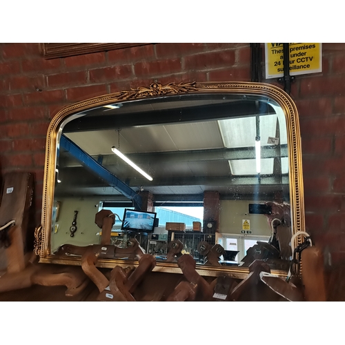 34 - Gilt framed over mantle mirror - W122cm x H79cm - god condition