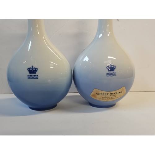 128 - Two Royal Copenhagen Decanters Cherry Heering liquer 43o proof : Fredericksborg Castle No 44266 and ... 